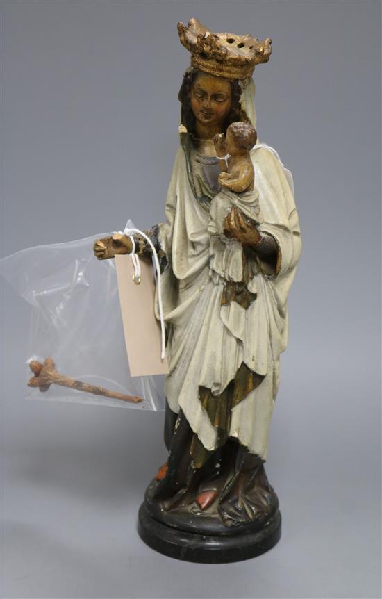 A cast icon of Madonna and Child